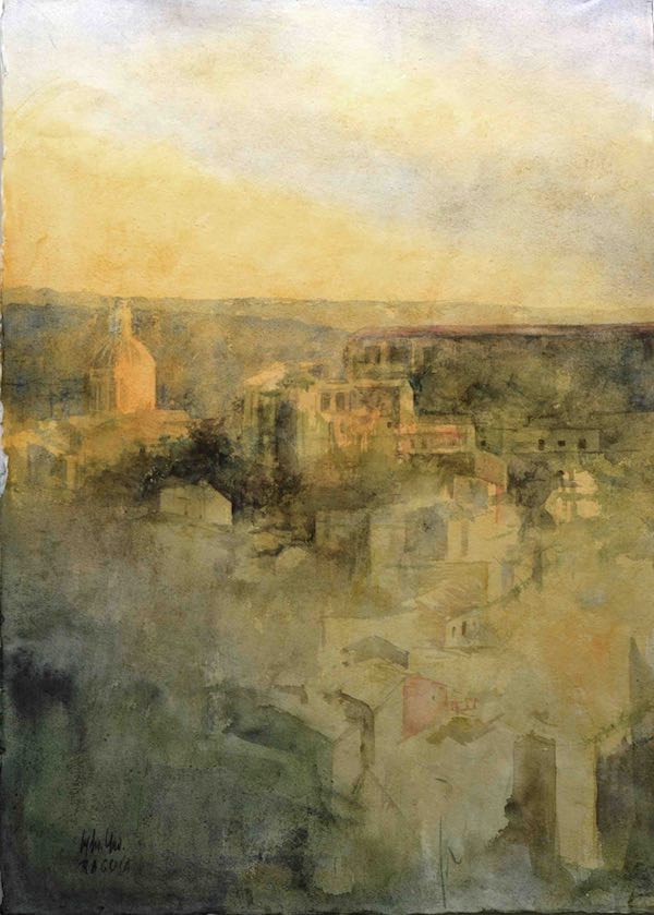 Ragusa Ibla secondo Pedro Cano. La città emerge dalla luce più che dal disegno: forme, architetture e paesaggio si dissolvono nell’atmosfera. Per Cano dipingere significa cogliere l’equilibrio tra luce, spazio e memoria, lasciando che l’acquarello suggerisca più di quanto descriva.